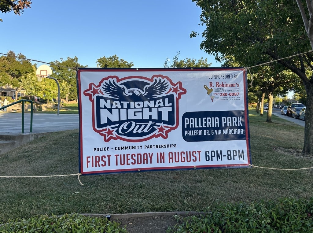 A banner prepared American Canyon for National Night Out at Palleria Park. Fiona Ulrich photo