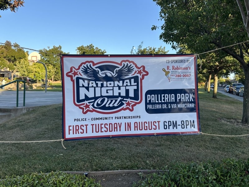 A banner prepared American Canyon for National Night Out at Palleria Park. Fiona Ulrich photo
