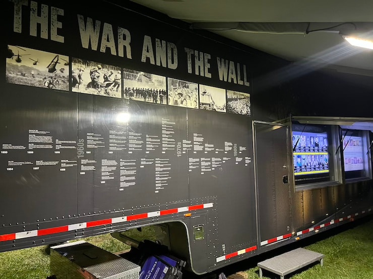 Vietnam War timeline on the side of the Wall That Heals big rig.