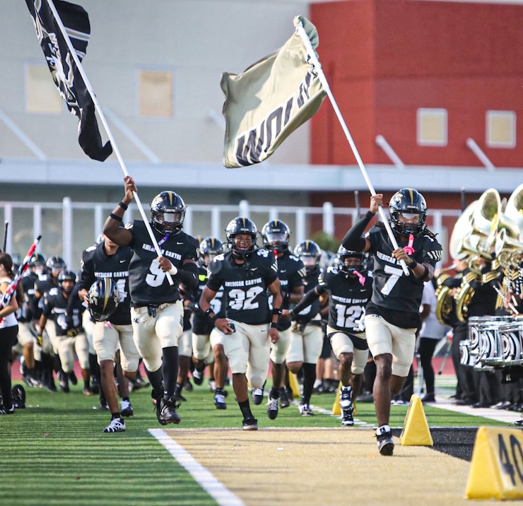 Evan Emmons, Lorenzo Seymour, Webster Burks, Miles Baylor leading up the celebration