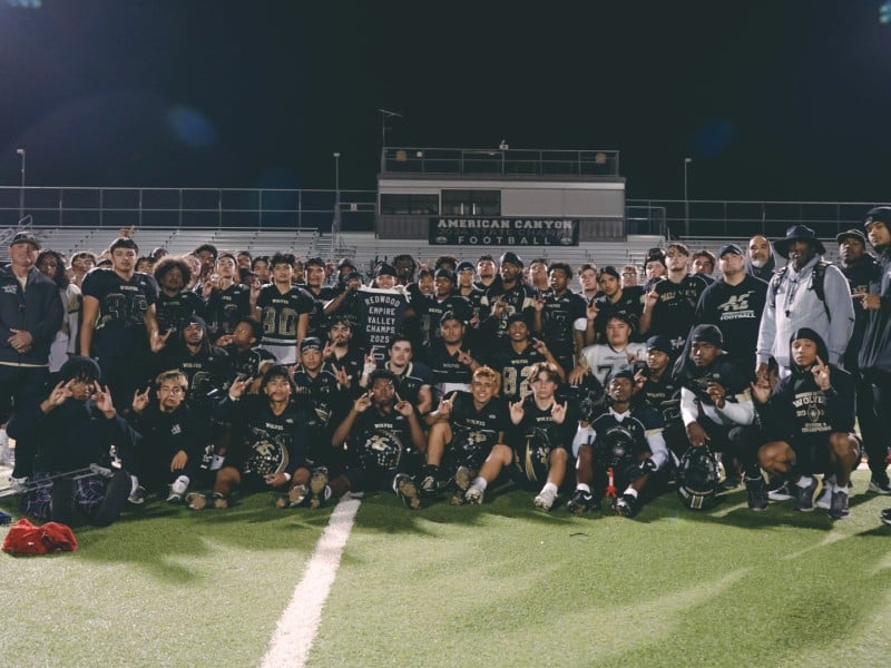 American Canyon Wolves football team gathered on the field