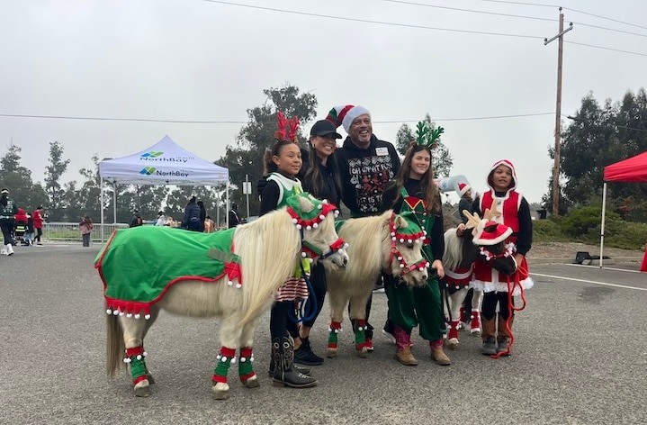 Mayor Pierre Washington and Cherylyn and kids and miniature horses at Reindeer Run