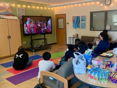 LGBTQ+ club members watching To Wong Foo, Thanks for Everything