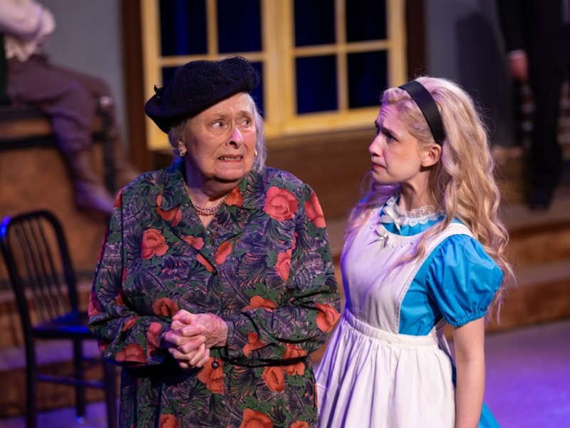 Two actors in costume in a play