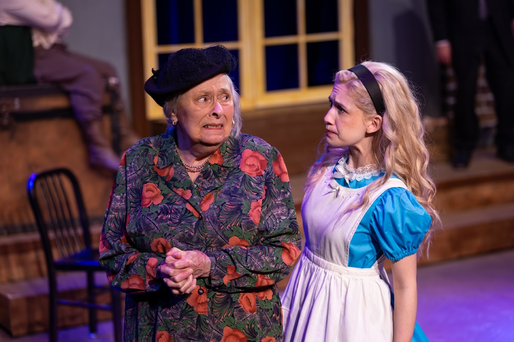 Two actors in costume in a play