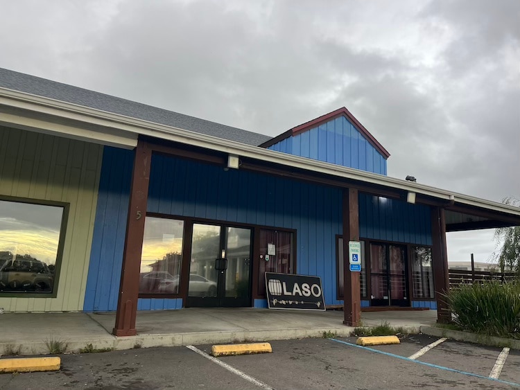empty storefront blue building