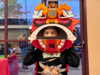 child in dragon head