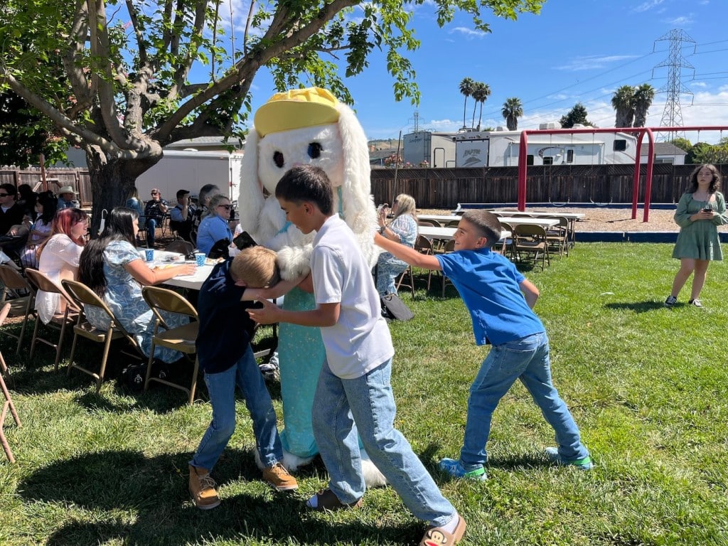 kids beating up easter bunny