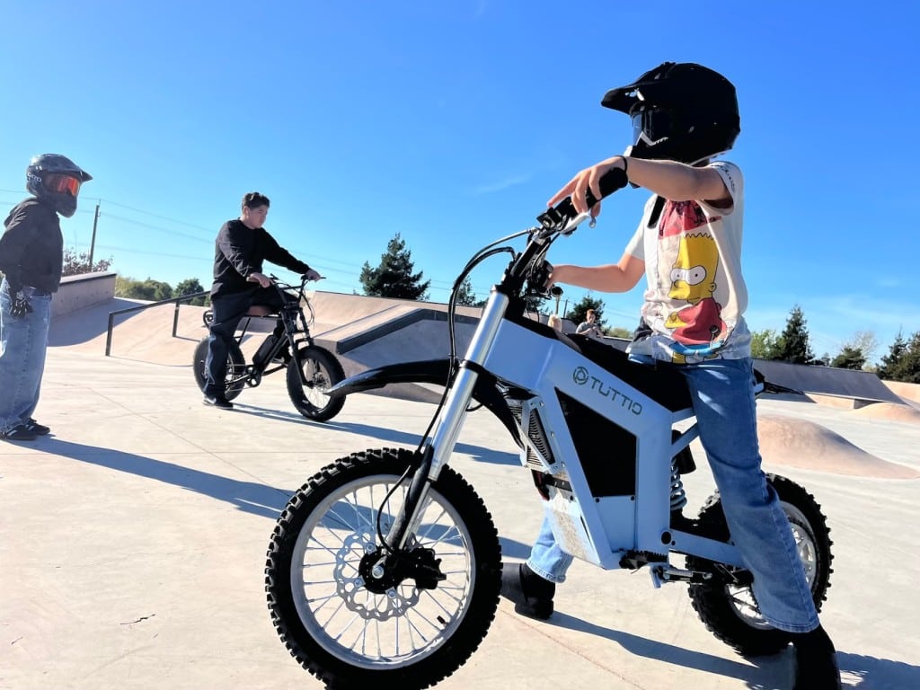 kids on bikes in a skatepark
