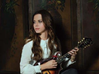 woman with small guitar