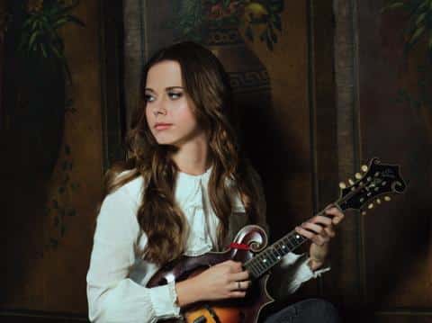 woman with small guitar