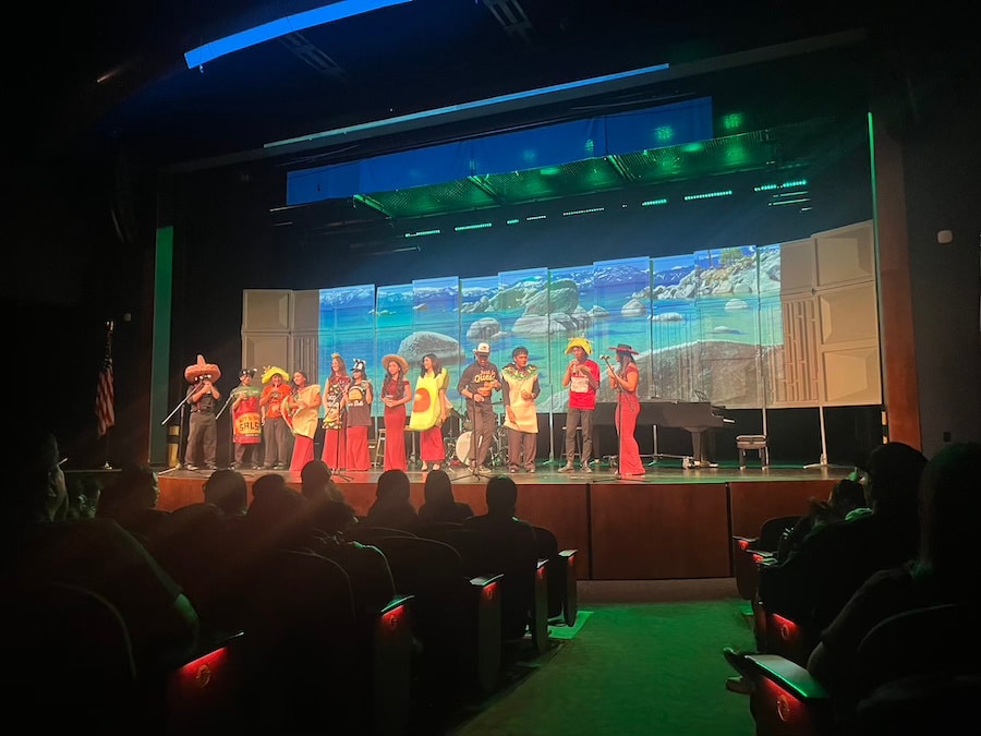 kids onstage dressed as tacos singing